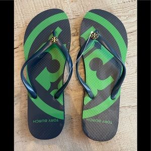 Brand new Tory Burch navy flip flops. New with tags. Size 9